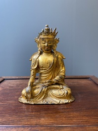 A fine Chinese gilt bronze sculpture of Shakyamuni Buddha, 15/16th C.