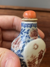 A Chinese blue, white and copper-red snuff bottle, Yongzheng mark and of the period