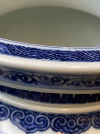 A large Chinese blue and white 'bajixiang' tripod censer with lotus scrolls, Qianlong