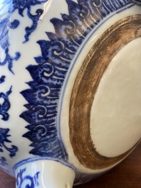 A large Chinese blue and white 'bajixiang' tripod censer with lotus scrolls, Qianlong