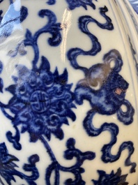 A large Chinese blue and white 'bajixiang' tripod censer with lotus scrolls, Qianlong