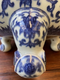 A large Chinese blue and white 'bajixiang' tripod censer with lotus scrolls, Qianlong