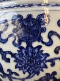 A large Chinese blue and white 'bajixiang' tripod censer with lotus scrolls, Qianlong