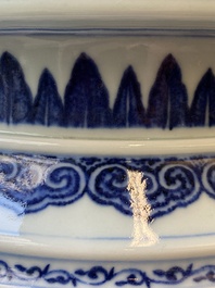 A large Chinese blue and white 'bajixiang' tripod censer with lotus scrolls, Qianlong