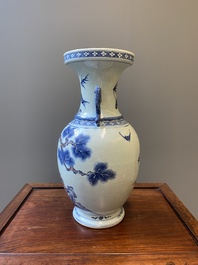 A Chinese blue, white and copper-red vase with two deer near a pine tree, Qianlong