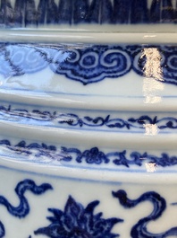 A large Chinese blue and white 'bajixiang' tripod censer with lotus scrolls, Qianlong