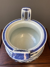 A large Chinese blue and white 'bajixiang' tripod censer with lotus scrolls, Qianlong
