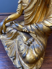 A fine Chinese gilt bronze sculpture of Shakyamuni Buddha, 15/16th C.