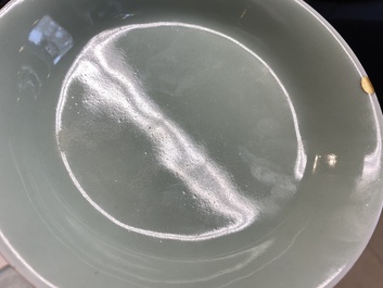 A pair of Chinese monochrome celadon-glazed plates, Qianlong mark and of the period