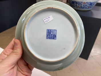 A pair of Chinese monochrome celadon-glazed plates, Qianlong mark and of the period