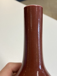 A Chinese monochrome dark ruby-red-glazed bottle vase, Qianlong mark and of the period