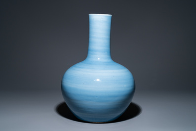A large Chinese monochrome claire-de-lune-glazed bottle vase, 19th C.