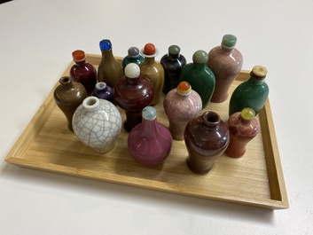 Sixteen Chinese polychrome porcelain snuff bottles and miniature vases, 18/20th C.