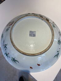 A fine and large Chinese famille rose 'nine peaches' dish, Qianlong mark, 19th C.