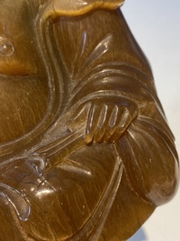 A rare Chinese rhinoceros horn sculpture of Buddha, 19th C.