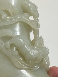 A fine Chinese white jade 'buddhist lions' vase and cover, Qing