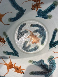 A Chinese famille rose green sgraffito-ground 'antiquities' fish bowl, 19th C.