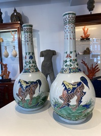 A pair of large Chinese famille verte 'mythic animals' vases, Kangxi