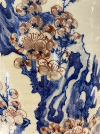 An exceptional large Chinese blue, white and copper-red 'meiping' vase with prunus blossoms, 18th C.