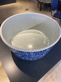 An exceptionally large Chinese blue and white basin with floral scrolls, Kangxi