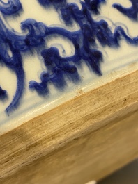 An exceptionally large Chinese blue and white basin with floral scrolls, Kangxi