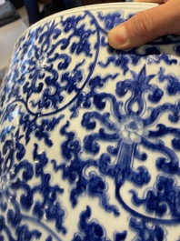 An exceptionally large Chinese blue and white basin with floral scrolls, Kangxi
