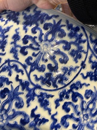 An exceptionally large Chinese blue and white basin with floral scrolls, Kangxi