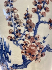 An exceptional large Chinese blue, white and copper-red 'meiping' vase with prunus blossoms, 18th C.