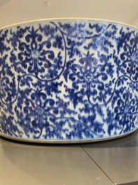 An exceptionally large Chinese blue and white basin with floral scrolls, Kangxi