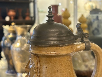 An exceptionally fine pewter-lidded stoneware bellarmine jug with portrait medallions, Cologne, Germany, 2nd quarter 16th C.