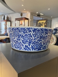 An exceptionally large Chinese blue and white basin with floral scrolls, Kangxi