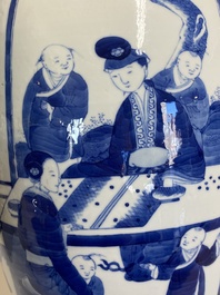 A pair of large Chinese blue and white jars and covers with ladies playing a game of go, 19th C.