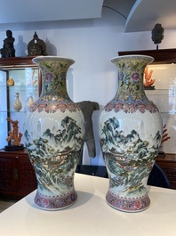 A pair of fine Chinese famille rose 'landscape' vases, Qianlong mark, 20th C.