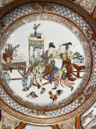 A Chinese famille rose plate with musicians playing the drums, Yongzheng