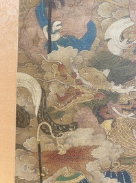 Chinese school: 'A sky full of Buddhist divinities', ink and colour on silk, 18th C.