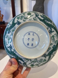 A Chinese doucai green-enamelled 'dragon' dish, Kangxi mark and probably of the period