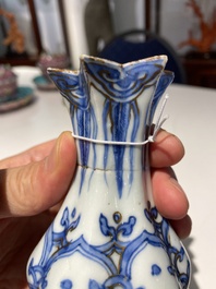 A Chinese blue and white 'pomegranate' kendi with gilt highlights, Wanli