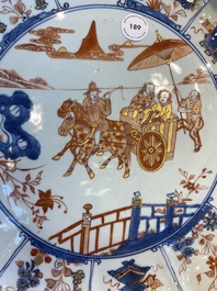 A large Chinese famille verte dish decorated with a European couple in a carriage, Kangxi