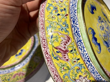 A pair of Chinese Canton enamel plates with exceptionally fine floral design, Yongzheng