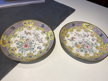 A pair of Chinese Canton enamel plates with exceptionally fine floral design, Yongzheng