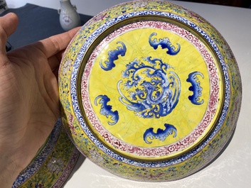 A pair of Chinese Canton enamel plates with exceptionally fine floral design, Yongzheng