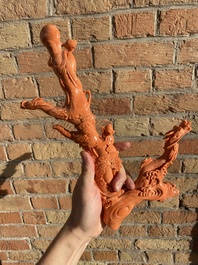 A Chinese red coral figure of a standing Bodhisattva with two dragons, 19/20th C.