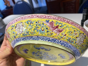 A pair of Chinese Canton enamel plates with exceptionally fine floral design, Yongzheng