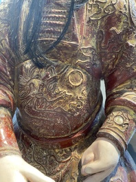 A large Chinese lacquered and polychromed wood sculpture of Guandi, 18th C.