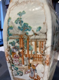 A pair of Chinese hexagonal famille rose 'mandarin subject' vases, Qianlong