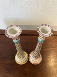 A pair of Chinese Canton enamel 'lotus' candlesticks, Yongzheng