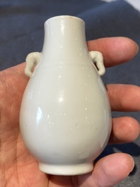 A small Chinese Dehua blanc de Chine elephant-handled 'hu' vase, 18th C.