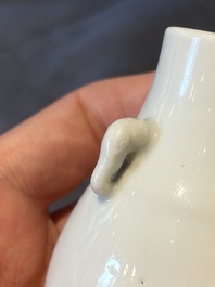 A small Chinese Dehua blanc de Chine elephant-handled 'hu' vase, 18th C.