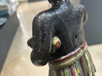 An English polychromed wood sculpture of a pipe-smoking Indian from a tobacco store, 18th C.
