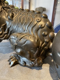 A rare Chinese inlaid bronze lion-form censer, Ming